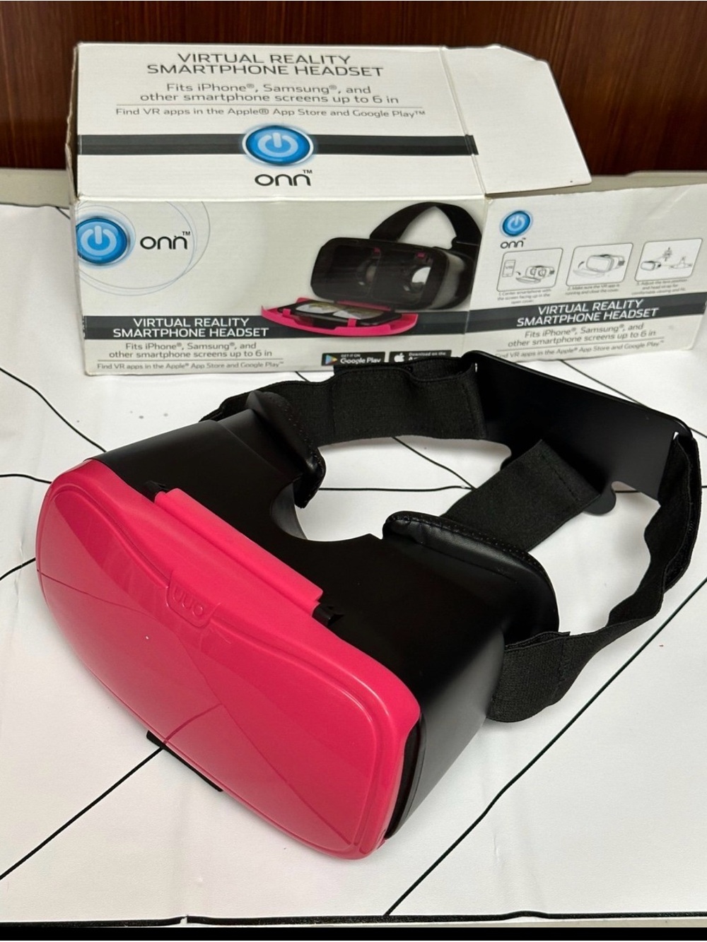 On Running Pink and Black Virtual Reality Smartphone Headset